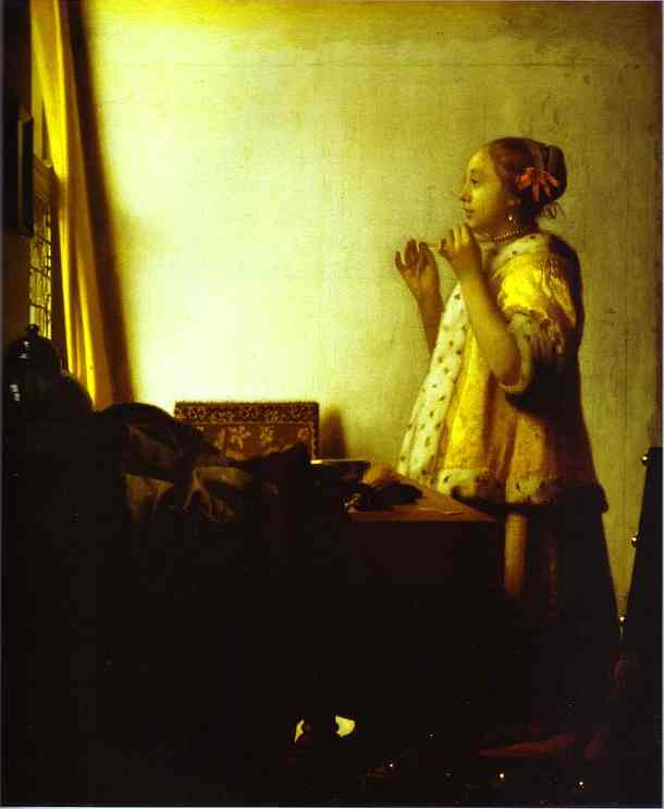 woman with a pearl necklace